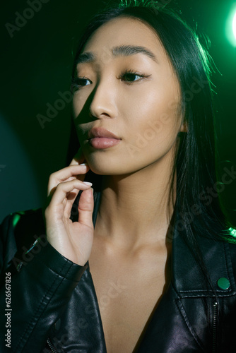 Woman neon person green depressed light model art trendy concept smoke hair portrait colourful