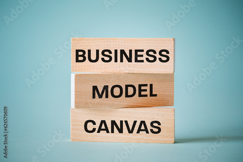 Business model canvas, Concept, Wooden blocks with slogan business model canvas, close up,