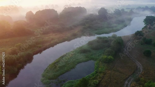 Incredible Morning summer landscape.Beautiful nature at sunrise with a view from above. Fog over the river