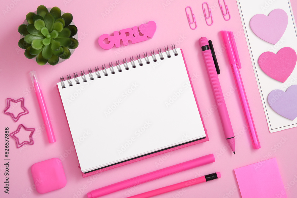 Blank notebook page for text in frame of yellow school and office stationery set on pink background. Eraser in the form of worg girl Blank notebook page for text in frame of yellow school and office stationery set on pink background. Eraser in the form of worg girl