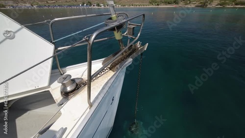 Wallpaper Mural Close-up of the anchor chain retracting on a yacht. Raising the anchor on a yacht, a winch unwinds an iron chain with an anchor, a marked chain waiting for the anchor to be raised Torontodigital.ca