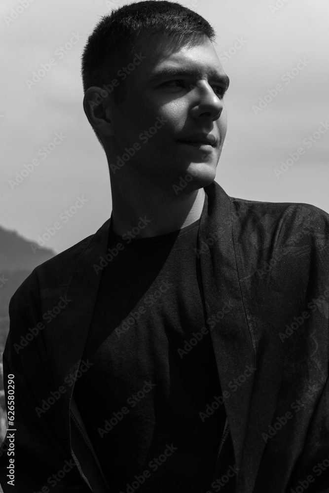 Obraz premium black and white portrait of a guy close-up