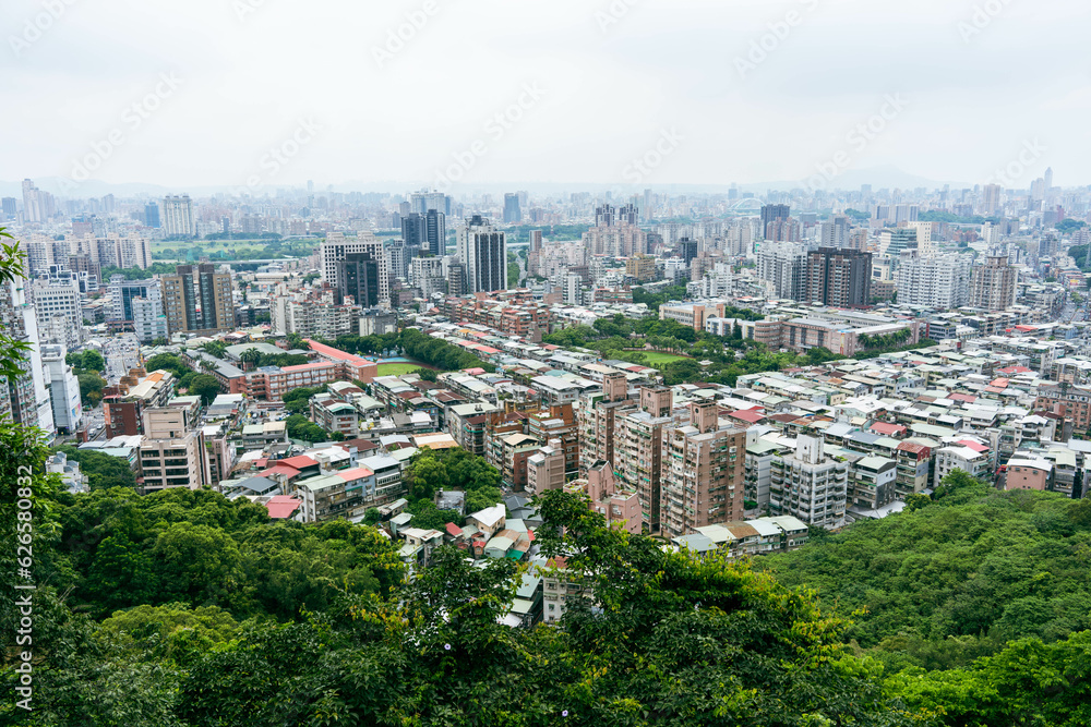 Fototapeta premium Taipei City, Taiwan - July 1 2023: Aerial view of the cityscape from Xianjiyan