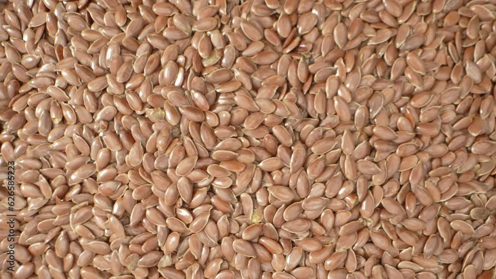 Through the probe lens, marvel at flax seeds' golden-brown hue, loaded with omega-3, fiber, and antioxidants, promoting heart health and overall well-being. Food concept. Flax Seeds background
Through the probe lens, marvel at flax seeds' golden-brown hue, loaded with omega-3, fiber, and antioxidants, promoting heart health and overall well-being. Food concept. Flax Seeds background