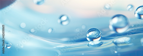 Water drops or oil bubbles on blue background. Droplets panorama picture.