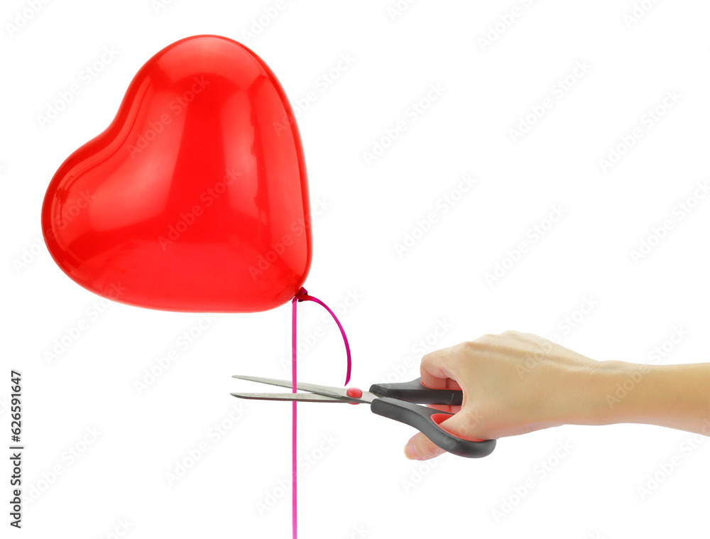 Hand with a scissor cutting a red heart shape balloon ribbon isolated on transparent, PNG. Βreaking up, separation concept Hand with a scissor cutting a red heart shape balloon ribbon isolated on transparent, PNG. Βreaking up, separation concept