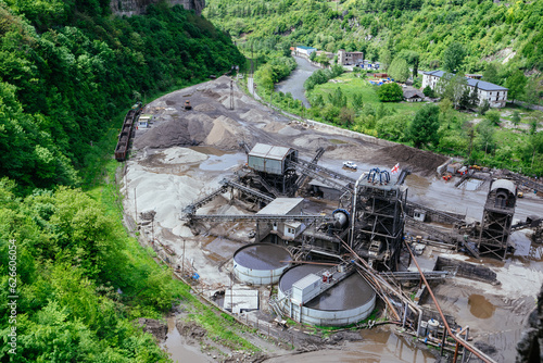 Ore dressing treatment plant at open pit mine, aerial view