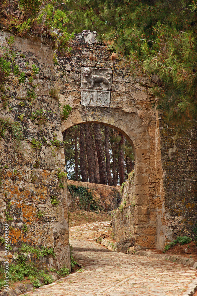 The third gate of the medieval Venetian castle of Zakynthos town, in Zakynthos island, Greece. Above the stone gate there can be seen the heraldic symbols (lion) of the Venetian Republic.