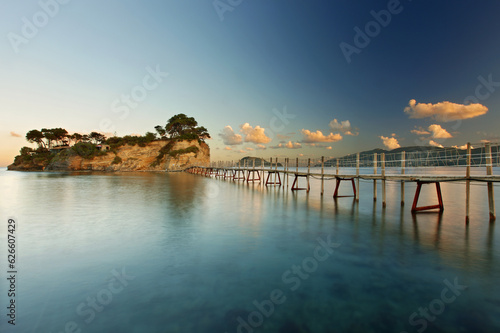 The small Cameo island (or Agios Sostis) and the wooden bridge that leads to it, in Zakynthos island, in the Ionian Sea, Greece, Europe.
