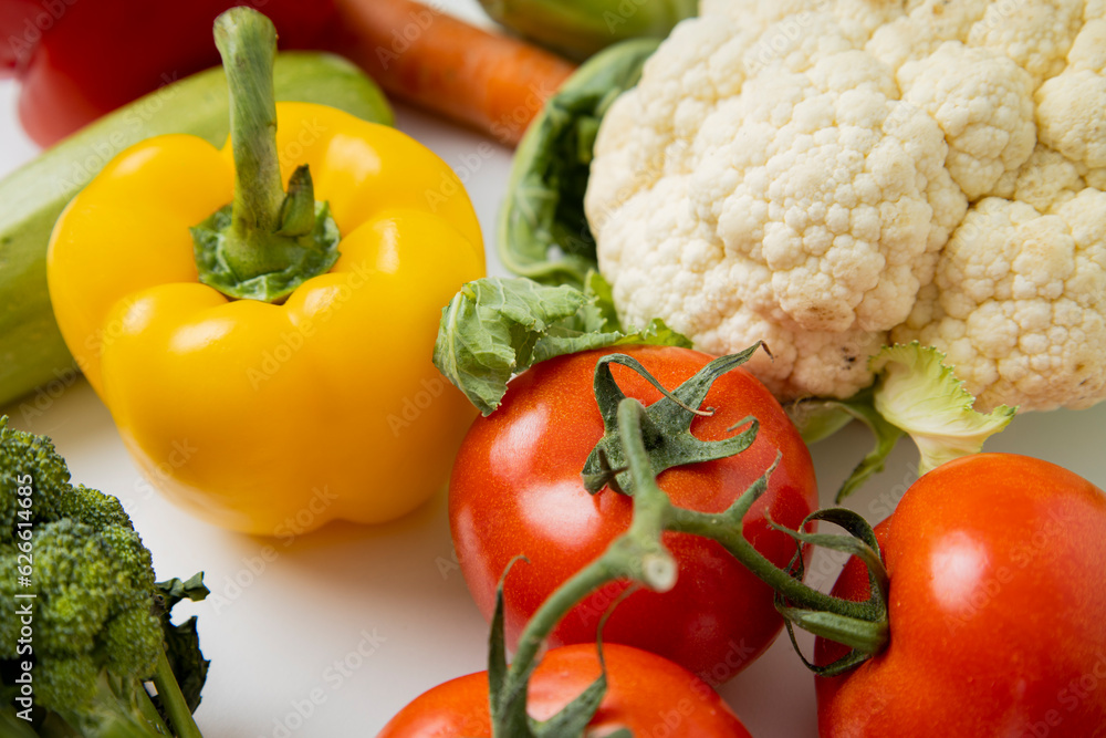 Fresh vegetables on a white background. Top view, flat lay Fresh vegetables on a white background. Top view, flat lay