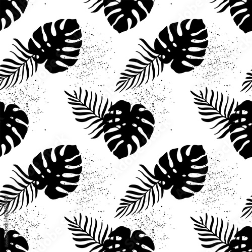 Black and white tropical pattern with fern and monstera leaves on a white background. Pattern for textiles, wrapping paper, covers, backgrounds, wallpapers