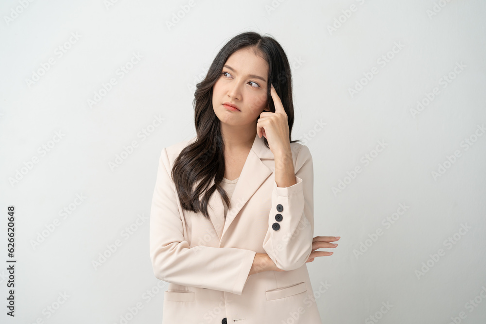 Asian young beautiful businesswoman face expression feel doubtful. Asian young beautiful businesswoman face expression feel doubtful.