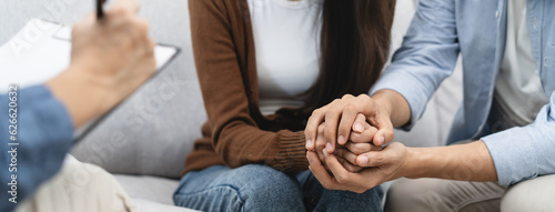 couple relationship therapy with a counselor. Close Up hands of the woman client during a conversation with psychologist to find problems and solution.