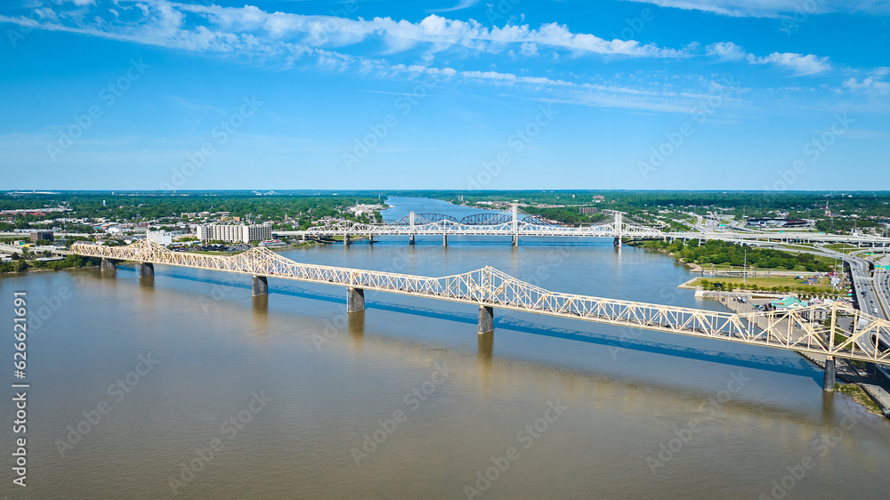 Blue sky over Ohio River two shores and four bridges aerial outside Louisville KY
