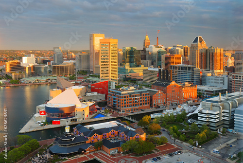 Bird's eye view of the Baltimore’s Inner Harbor at sunrise, Maryland.  Baltimore is a major city in Maryland with a long history as an important seaport.