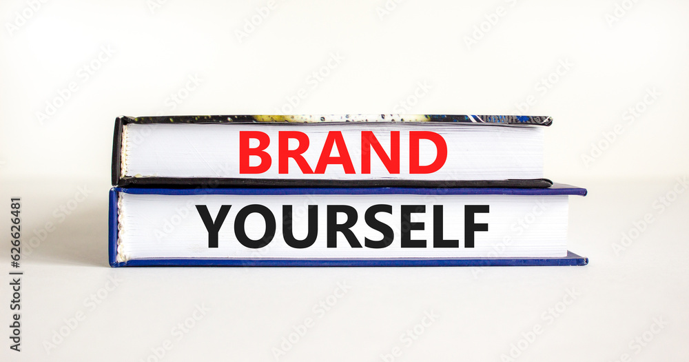 Brand yourself symbol. Concept words Brand yourself on beautiful books. Beautiful white table white background. Business brand yourself concept. Copy space.