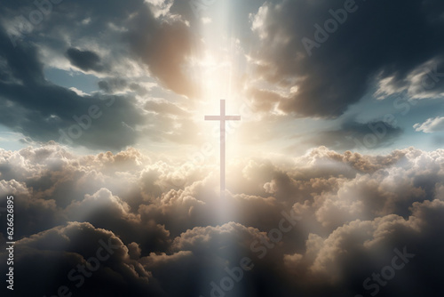 Rays of sunlight beaming through clouds focused on elevated cross