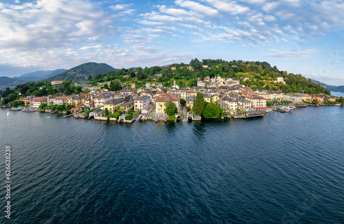 Aerial view of a beautiful village of Orta and its lake