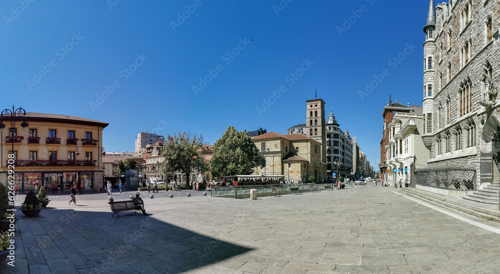 Panoramic view at the St. Marcelo square, Guzmanes Palace and Museo Casa Botines Gaudí, tourist people visiting, León downtown city, Spain