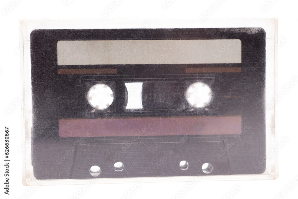 Obraz premium Close up of retro audio cassette tape, in case, isolated on white background, vintage 80's music concept.