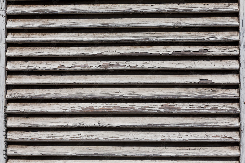 wooden shutters, covering a window or door wooden shutters, covering a window or door