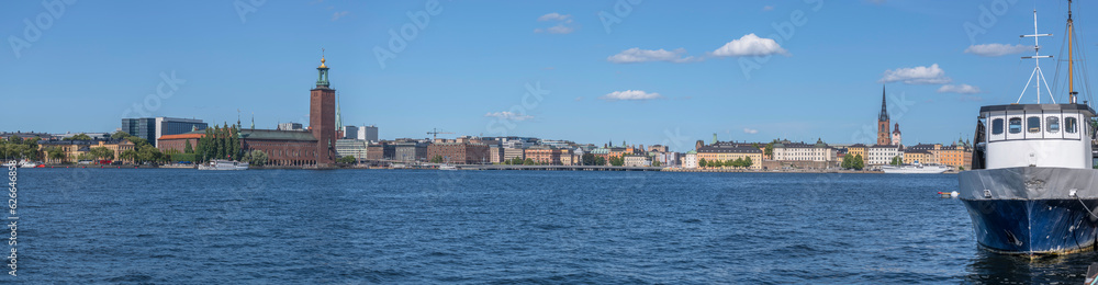 Panorama, the Town City Hall, the down town and old town at the bay Riddarfjärden, a sunny summer day in Stockholm