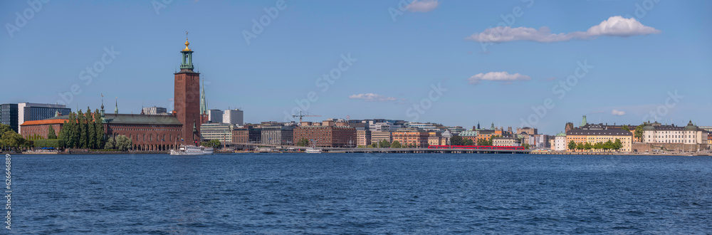 Panorama, the Town City Hall, the down town and old town at the bay Riddarfjärden, a sunny summer day in Stockholm