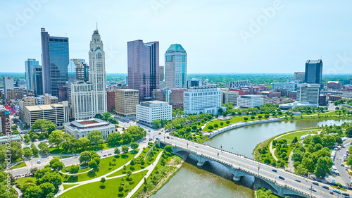 Green parks and bridge with downtown view of Columbus Ohio aerial © Nicholas J. Klein
