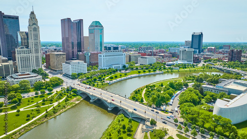 Bridge from Center of Science and Industry to skyscrapers in downtown Columbus Ohio aerial