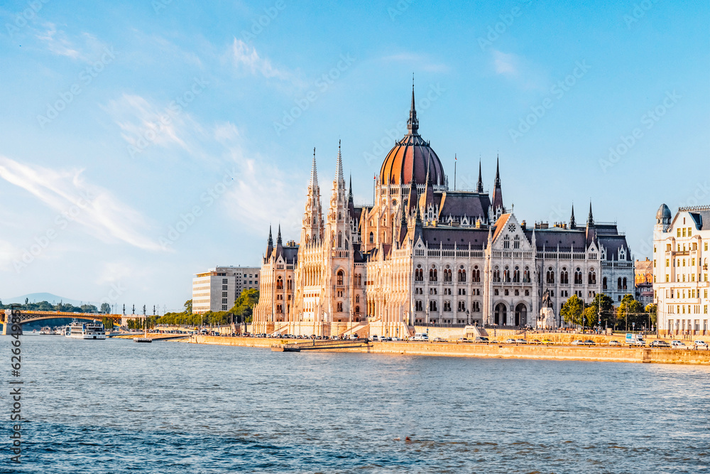 Fototapeta premium Parliament building in Budapest with fantastic perfect sky and reflection in water. calm Danube river. Popular Travel destinations.