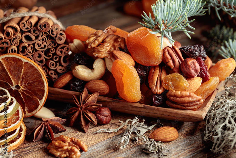 Christmas still-life with dried fruits and nuts. Christmas still-life with dried fruits and nuts.