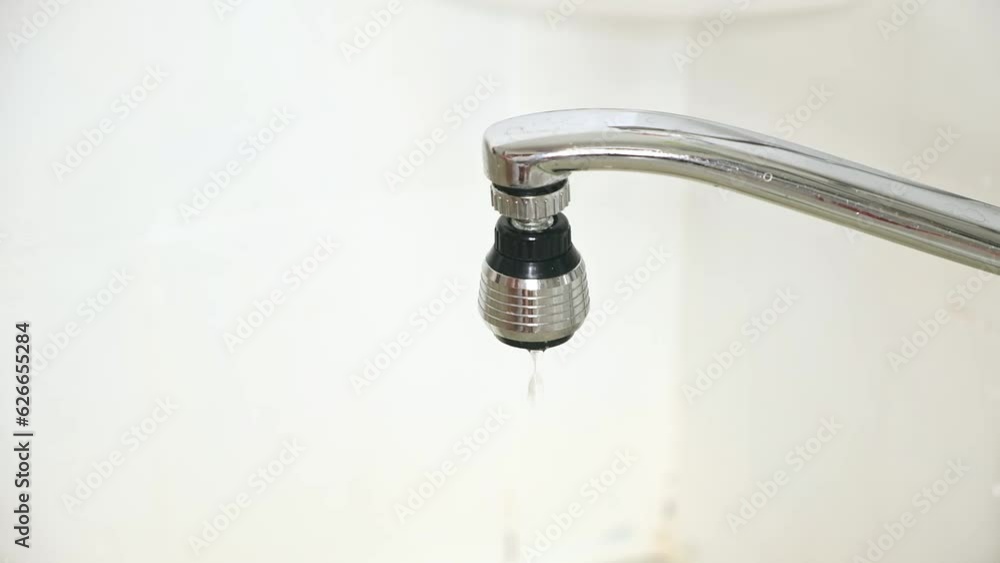 Running and dripping water. Turning off the water. Water tap , faucet. Flow water in bathroom with sink. Hygiene concept. Running and dripping water. Turning off the water. Water tap , faucet. Flow water in bathroom with sink. Hygiene concept.