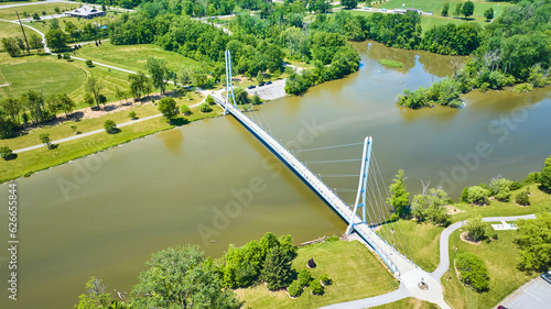 Aerial Ron Venderly Family Bridge pedestrian walking bridge over St. Joseph River to soccer fields