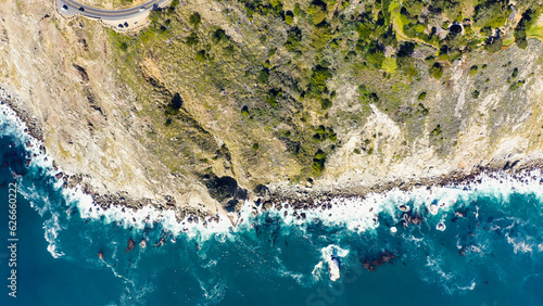Spectacular drone photo, top view of seascape ocean wave crashing rocky cliff. Beauty of the sea. Beaches where land and sea meet seascape. 