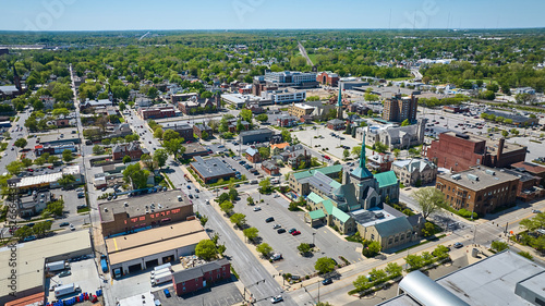 Downtown with churches Fort Wayne cityscape city houses businesses summer aerial