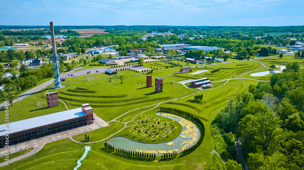 Ariel Foundation Park aerial with old factory structures and park tree maze