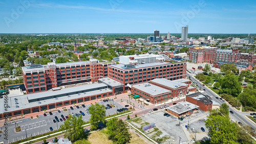 Aerial old General Electric Works factory building refurbished near park in downtown Fort Wayne