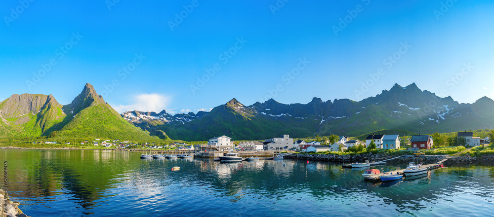 Naklejka premium Fishing base in village Mefjordvaer, island Senja, Norway, Mefjord Brygge. Fishing village in summer day, Panorama