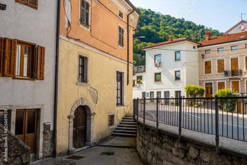 Small, mountain town of Kanal ob Soci, with beautiful bridge crossing the river and colorful houses