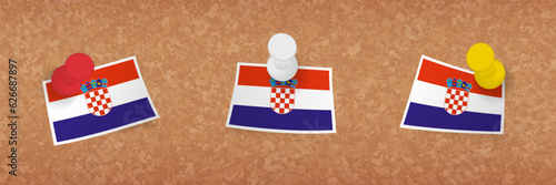 Croatia flag pinned in cork board, three versions of Croatia flag.
