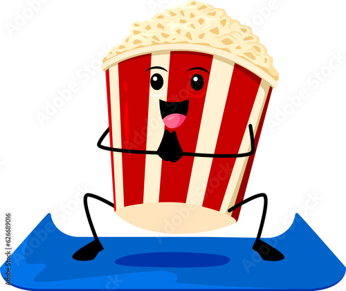Cartoon fast food popcorn character on yoga fitness sport. Street cafe meal comical mascot, junk food or cinema snack, takeaway cafe popcorn bucket isolated vector childish personage squatting on mat