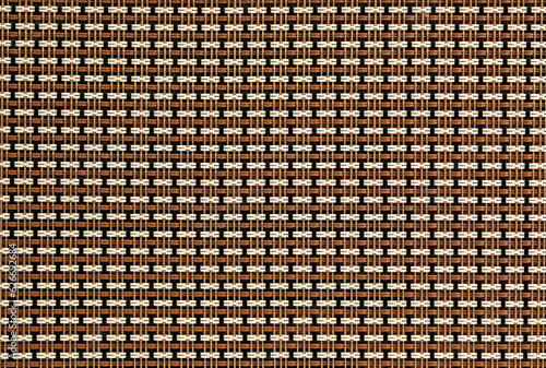 Close up  brown speaker grill cloth from the vintage electric guitar amp cabinet  texture for background.