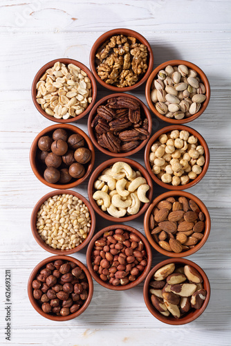 Mix of nuts in bowl . Food background
