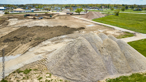 Gravel, rock, stone, glass piles at construction demolition site zone photo