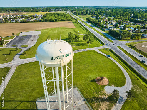 Close up of white Huntertown water tower in summer aerial photo