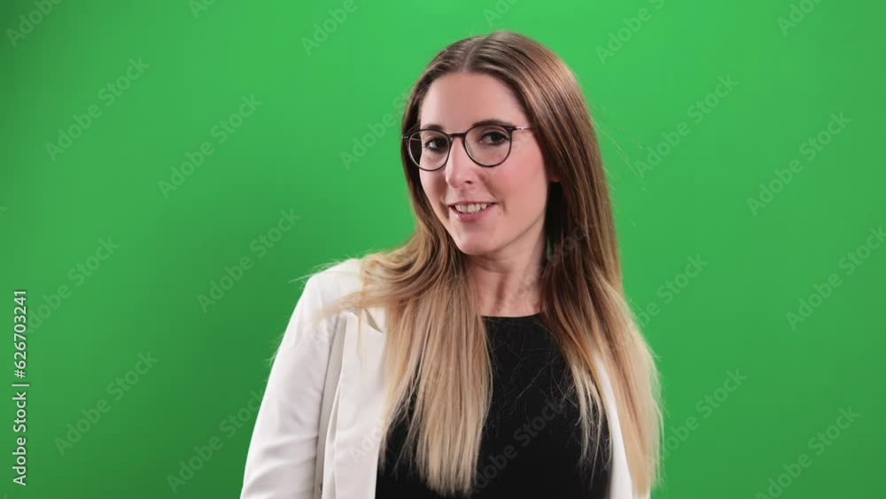 Beautiful blonde girl in a studio turning to the camera - extreme slow motion shot Beautiful blonde girl in a studio turning to the camera - extreme slow motion shot
