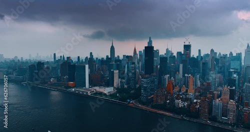 Wallpaper Mural Dull cityscape of New York in the evening time. Dramatic cloudscape covering the metropolis. Top view. Torontodigital.ca