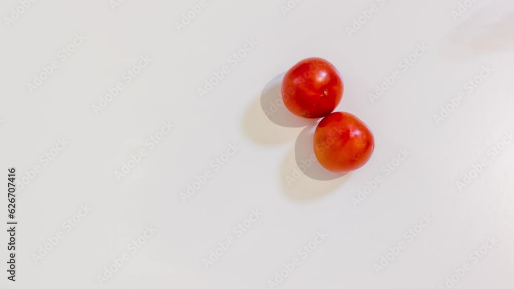 Two tomatoes with banana in the middle Two tomatoes with banana in the middle