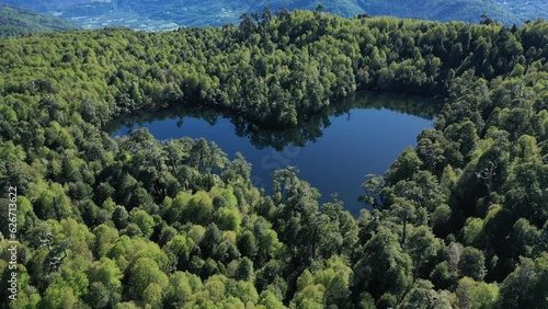 Dron view of real heart shape lagoon in Chile. Laguna coraszon in region Los Lagos Chile