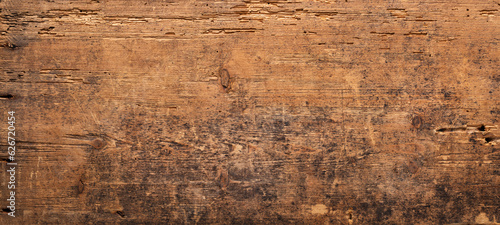 brown board as background. dark wood texture